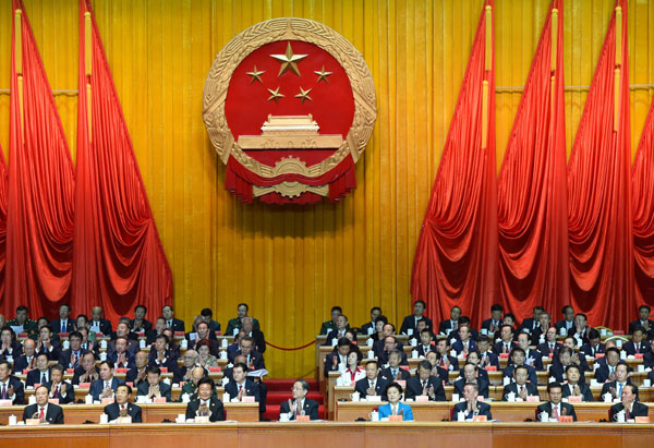 10月1日，慶祝中華人民共和國成立66周年暨新疆維吾爾自治區(qū)成立60周年大會在新疆人民會堂隆重舉行。 新華社記者 高潔 攝 