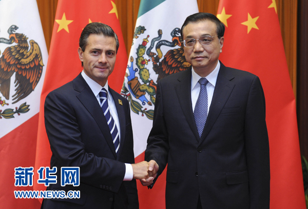 11月11日，國務(wù)院總理李克強(qiáng)在北京人民大會堂會見來華進(jìn)行國事訪問并出席亞太經(jīng)合組織第二十二次領(lǐng)導(dǎo)人非正式會議的墨西哥總統(tǒng)培尼亞。新華社記者張鐸 攝 